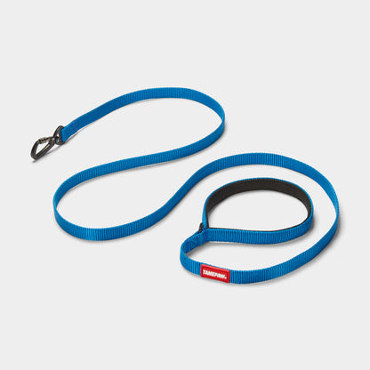 Blue Tamepaw dog leash with a red and white label on a light grey background